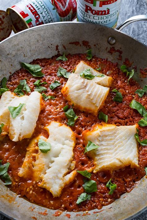 Cod Poached in Arrabbiata Sauce .